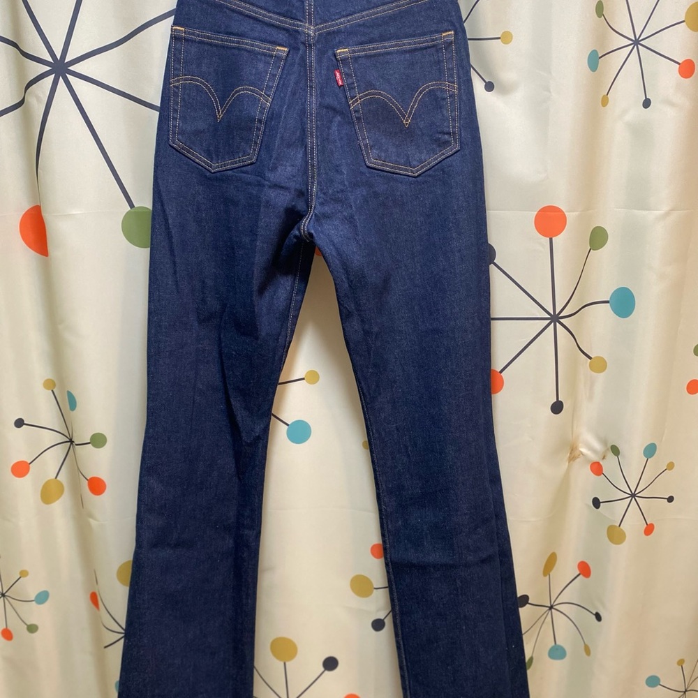 Women’s Levis premium ribcage boot cut size 27 rigid wash